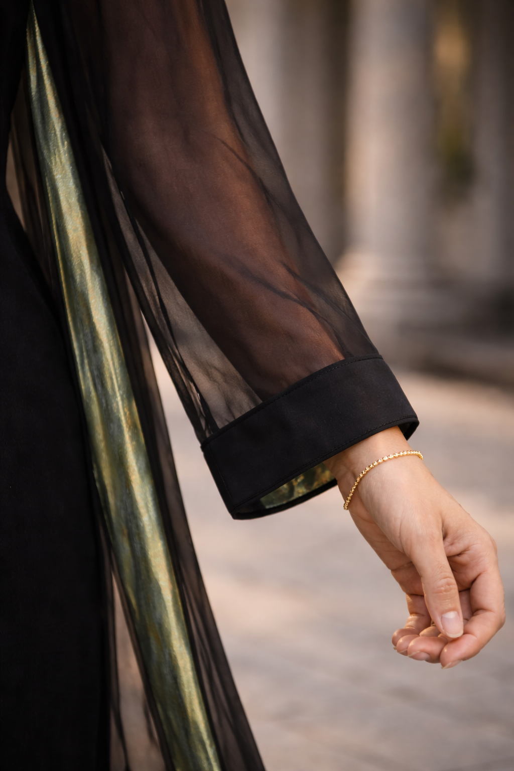 Iconic Chiffon Gilet – Black with Shimmery Green Inlet — styled view | VIVI & CO